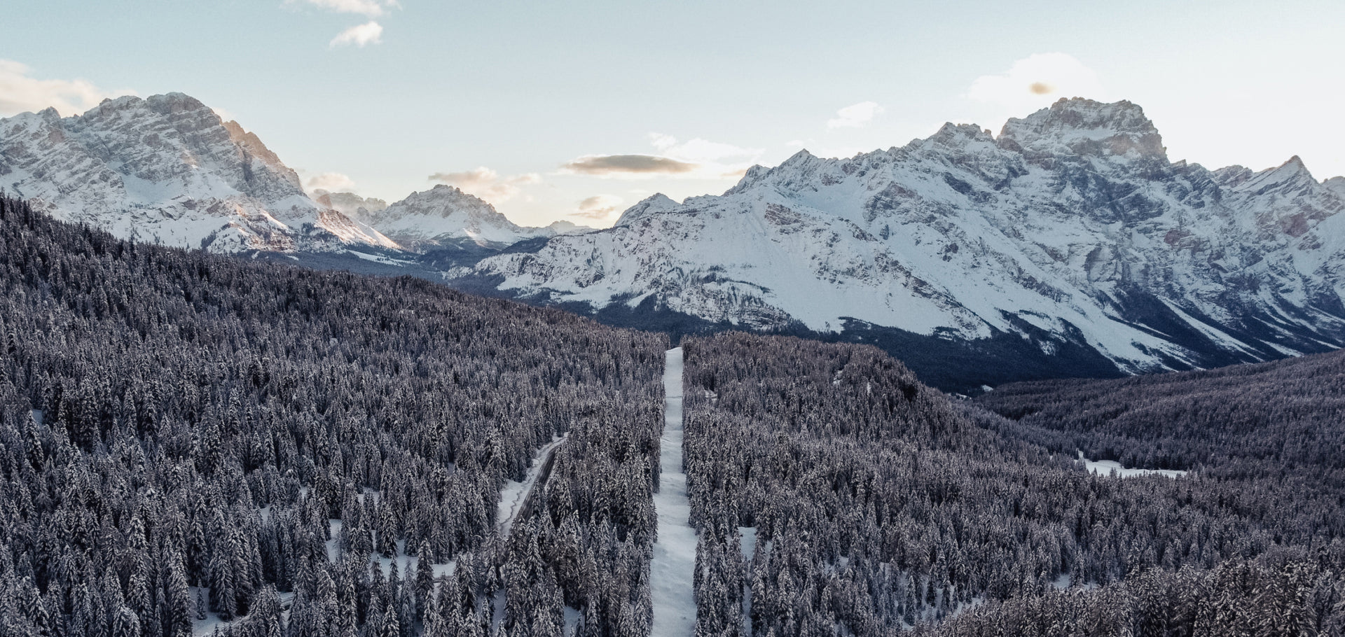 Italy is preparing for the 2026 Winter Olympics by increasing ski-area infrastructure, including new lifts. But before the lifts arrive, the forest must be severed by man-made lines. The question is, how many ski lifts does Italy really need?